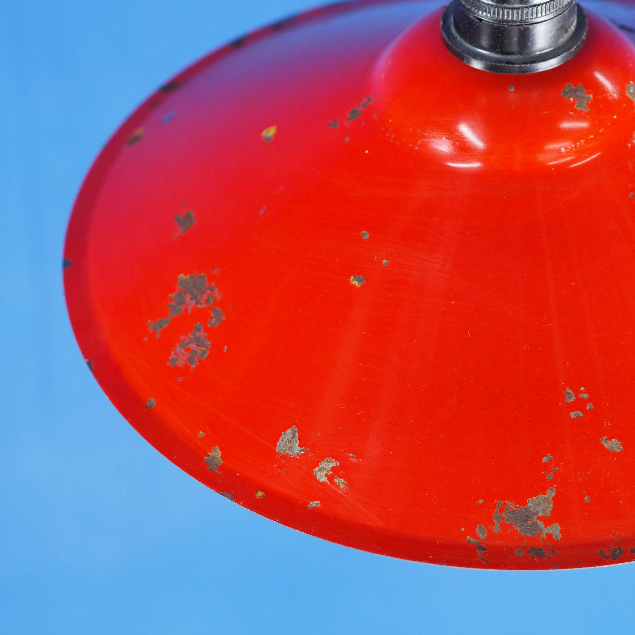 Hanging light with red enameled steel shade