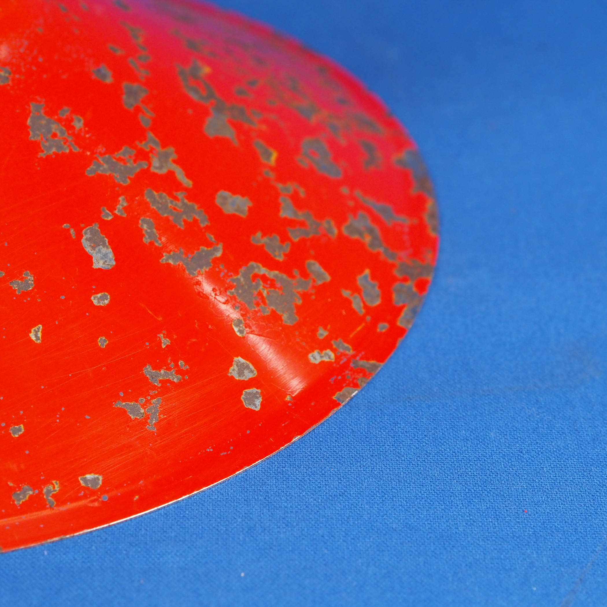 Hanging light with red enameled steel shade