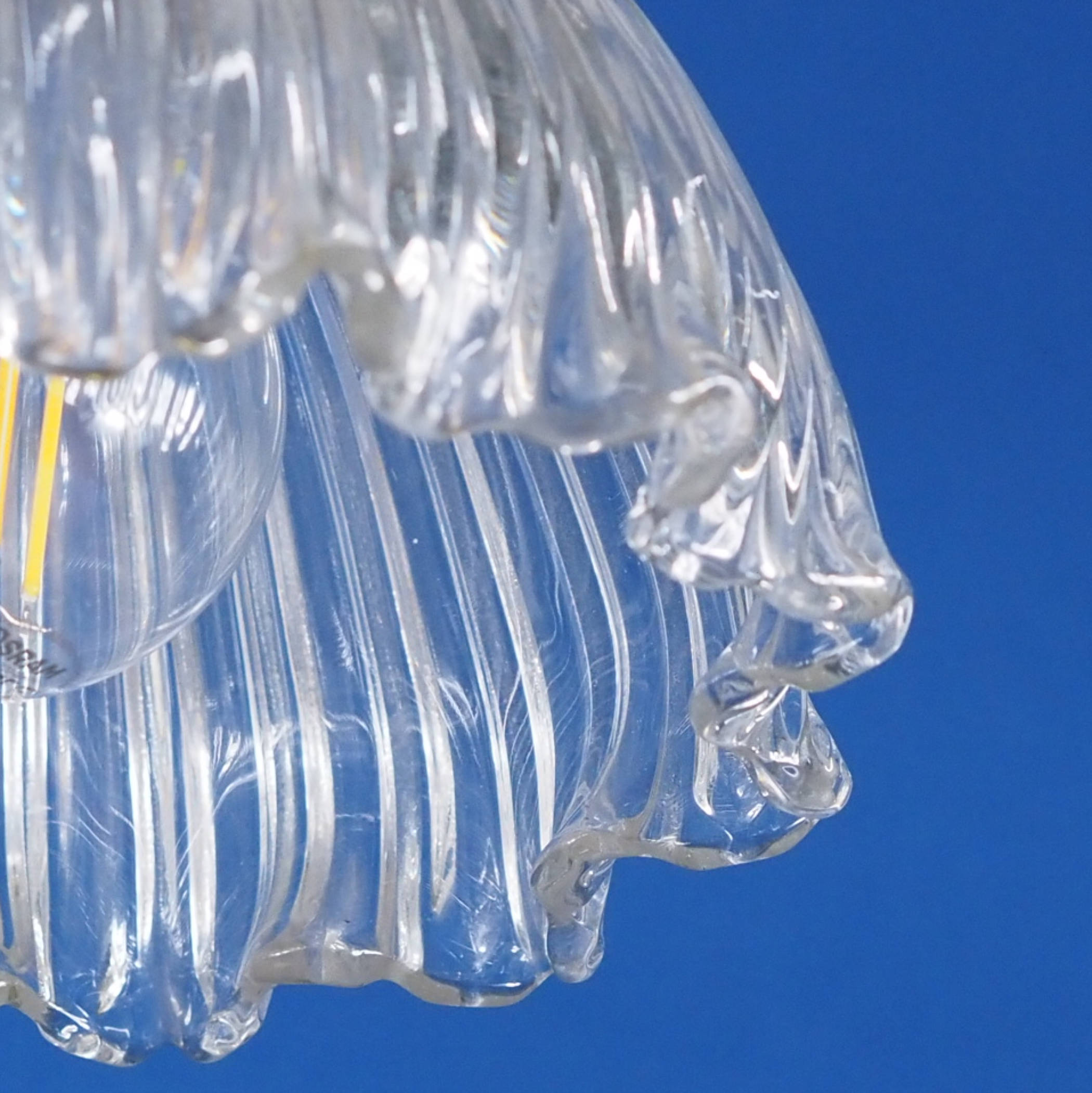 Hanging light with textured glass diffuser