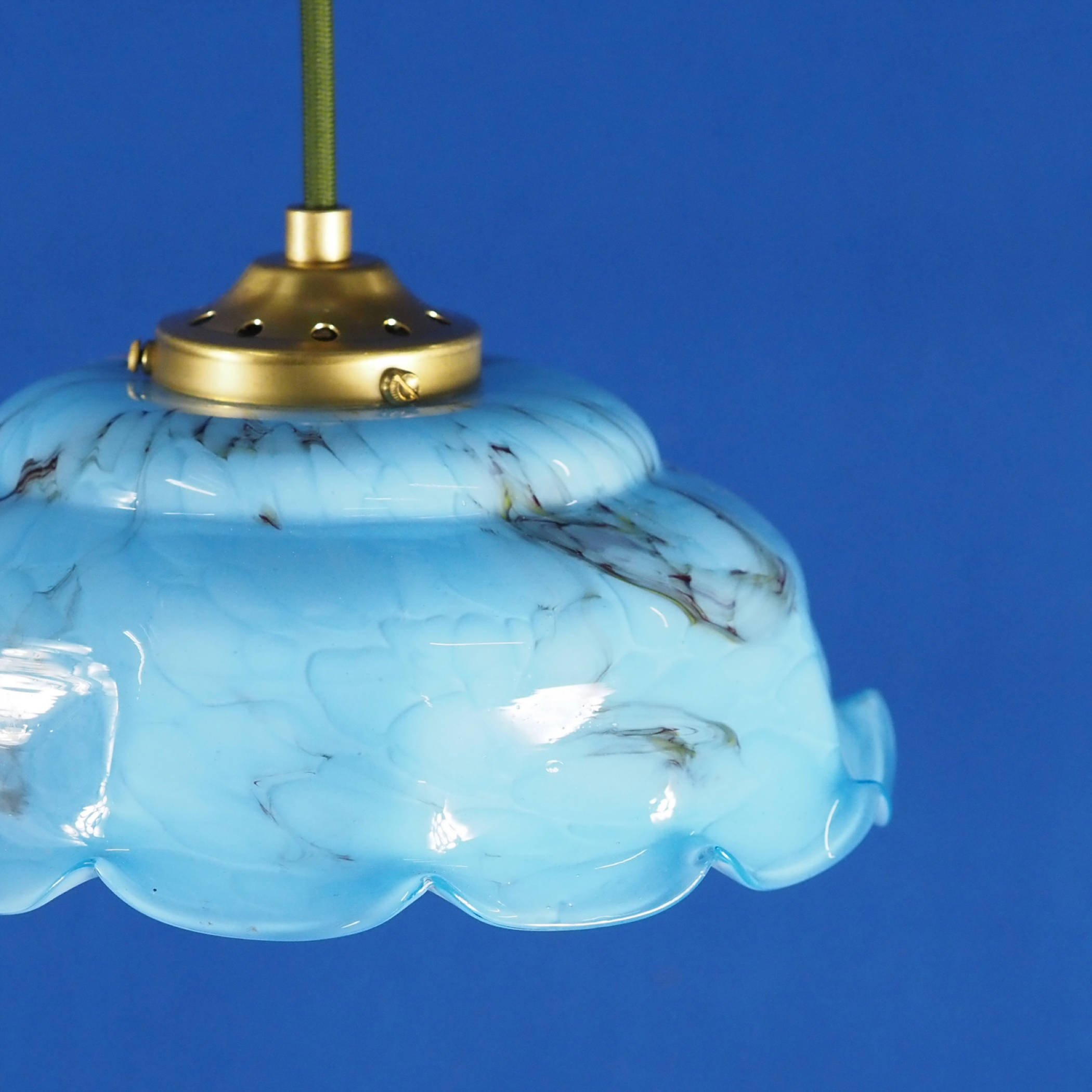 Hanging light with blue glass diffuser