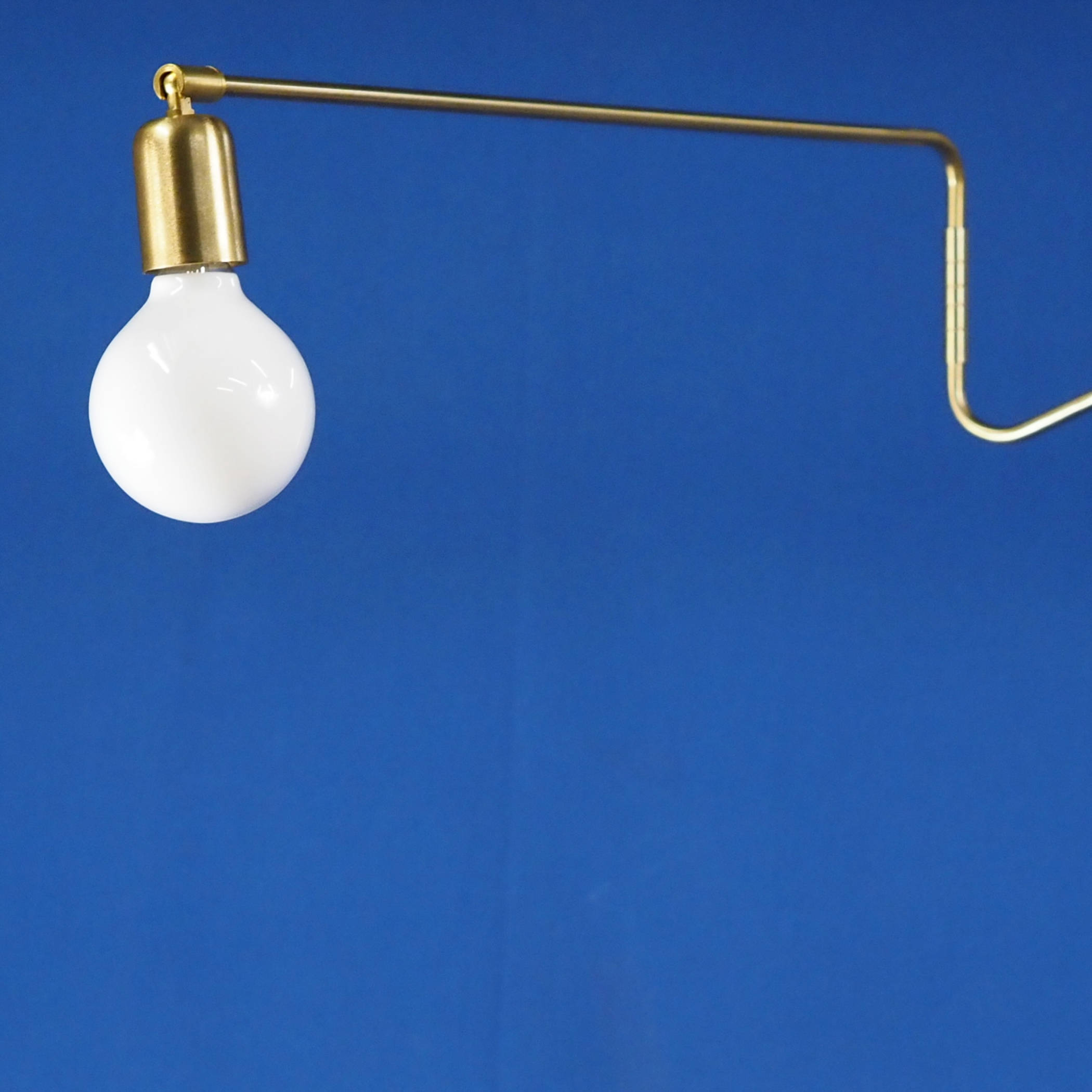 Wall light 'Swing' in brass-plated iron by House Doctor
