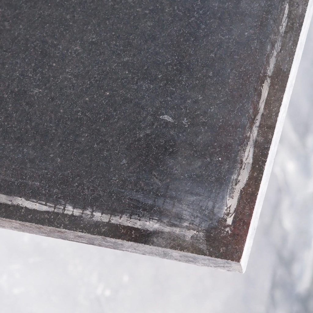 Black granite slabs from the Gare Montparnasse (115 x 115 cm)
