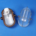 Caged wall/ceiling light with bakelite base, steel cage and textured glass diffuser