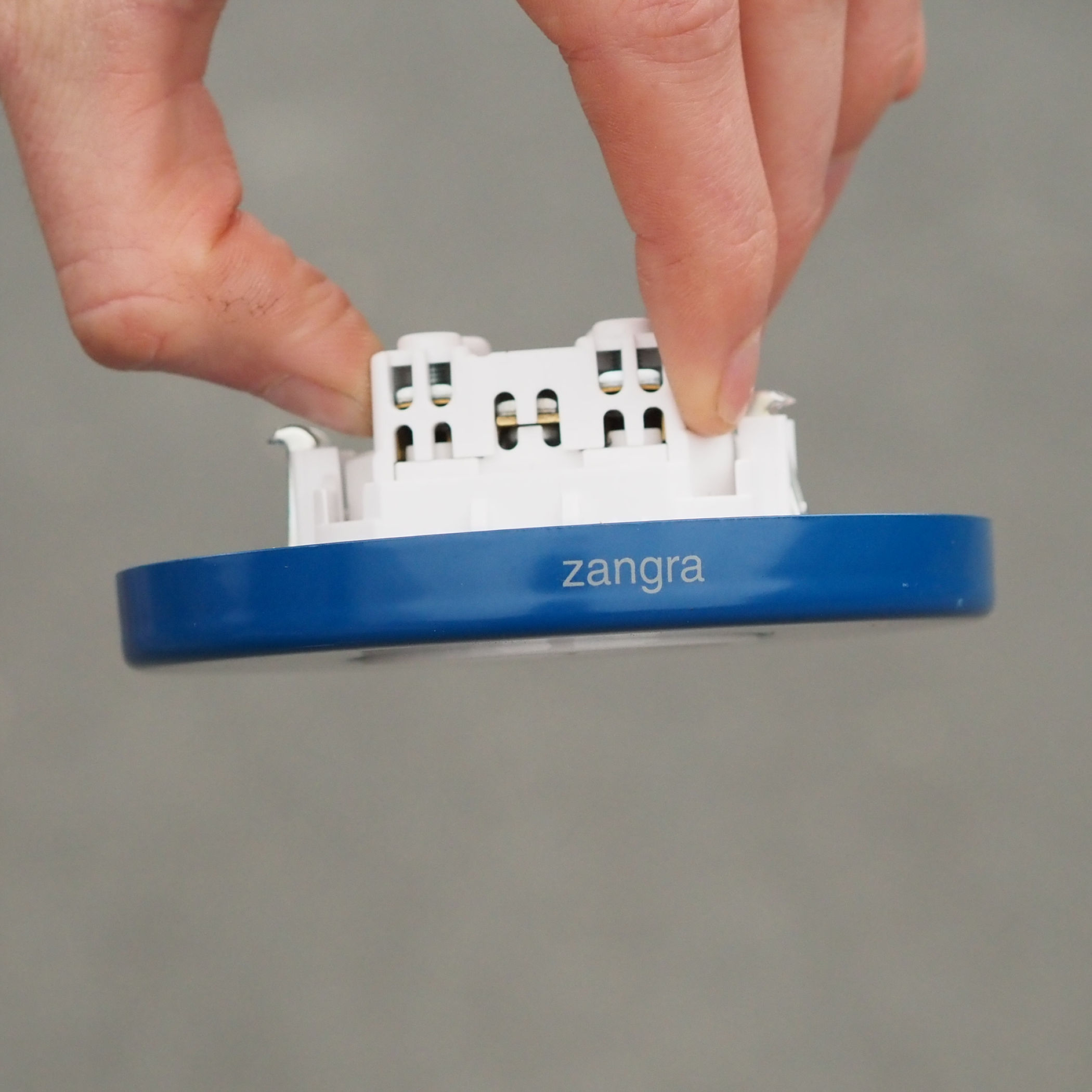 Built in electrical socket in blue lacquered steel by Zangra