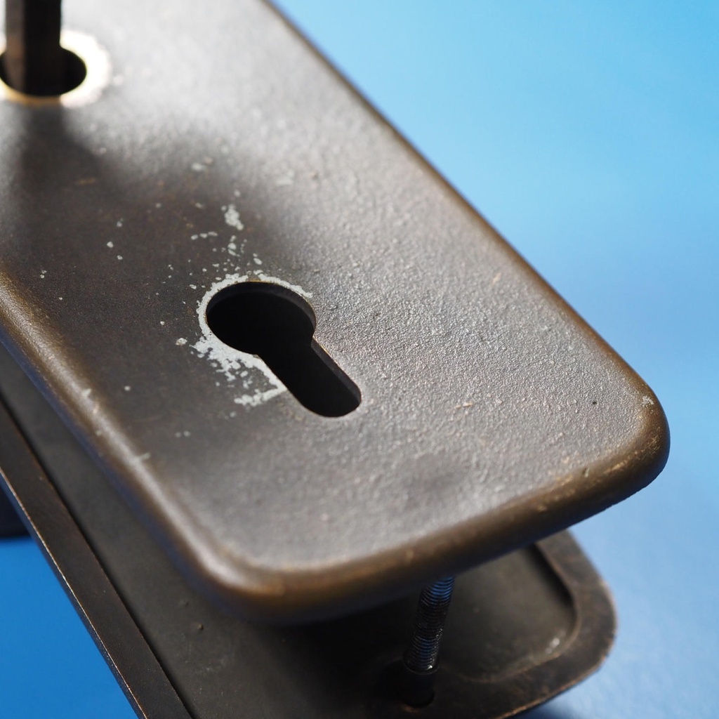 Double door handle with keyhole in sand-cast bronze by Jules Wabbes from the Générale de Banque - Swivel (Right or Left)