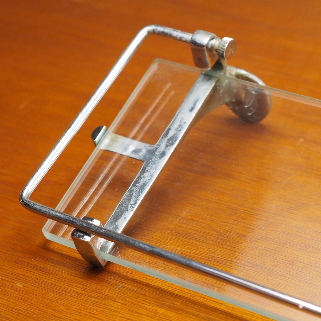 Bathroom shelf in clear tempered glass