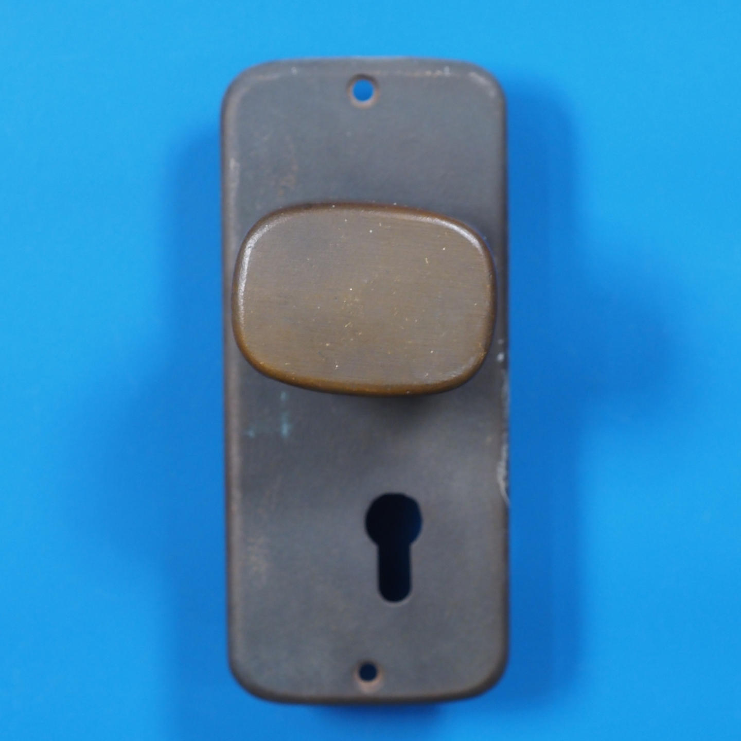 Single door handle with key and fixing holes in sand-cast bronze by Jules Wabbes from the Générale de Banque - Swivel (Left)