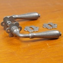 Door handle with key rosettes by Linea Bertomani