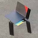 Black stackable chair by Pierre-Emmanuel Vandeputte (with various coloured corners)