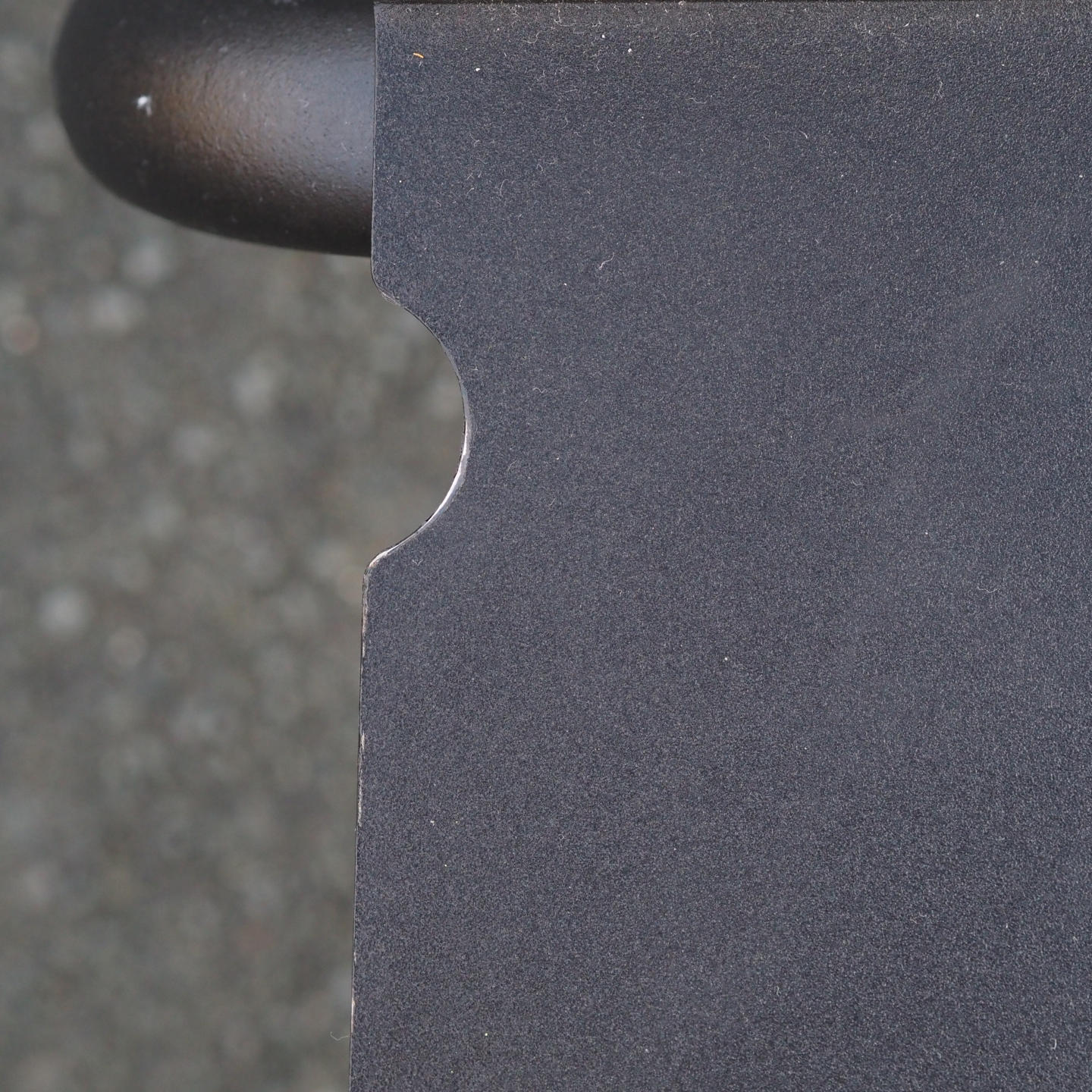 Black stackable chair by Pierre-Emmanuel Vandeputte (with various coloured corners)