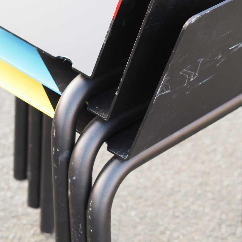 Black stackable chair by Pierre-Emmanuel Vandeputte (with various coloured corners)