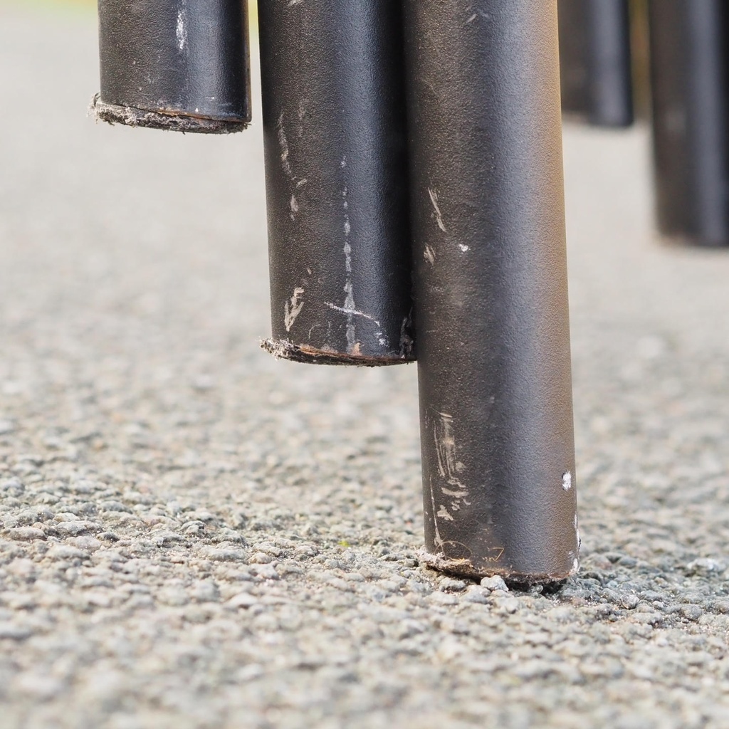 Black stackable chair by Pierre-Emmanuel Vandeputte (with various coloured corners)