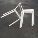 White stackable chair by Pierre-Emmanuel Vandeputte (with various coloured corners)