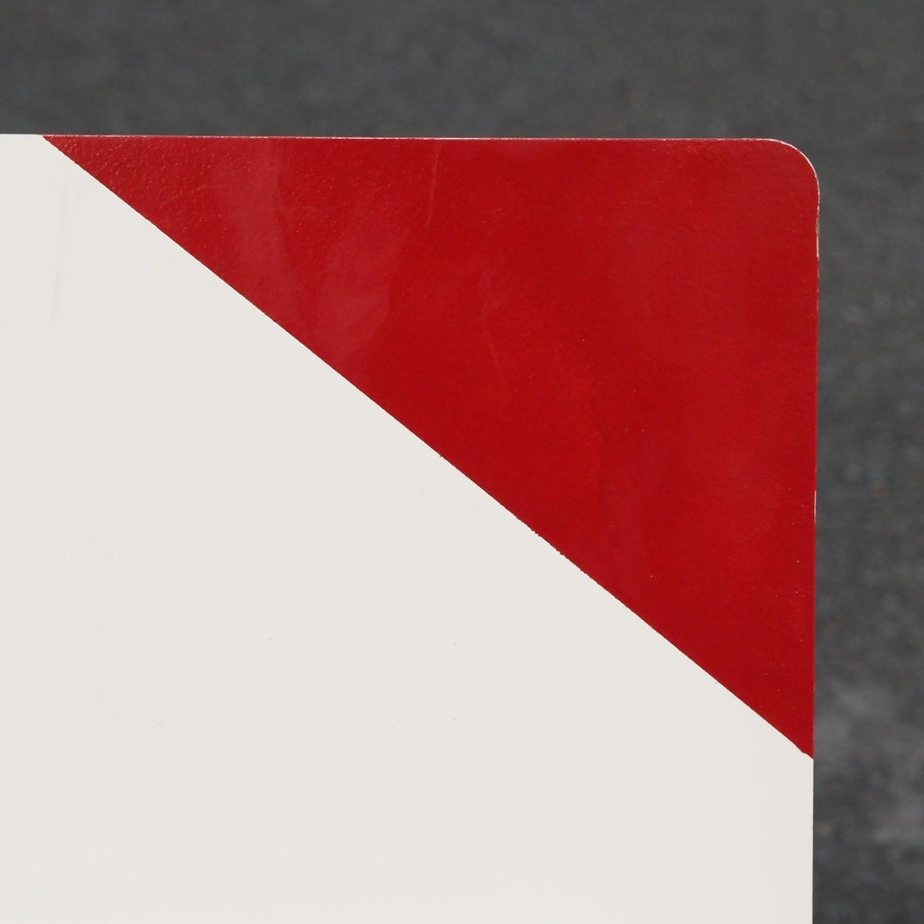 White stackable chair by Pierre-Emmanuel Vandeputte (with various coloured corners)