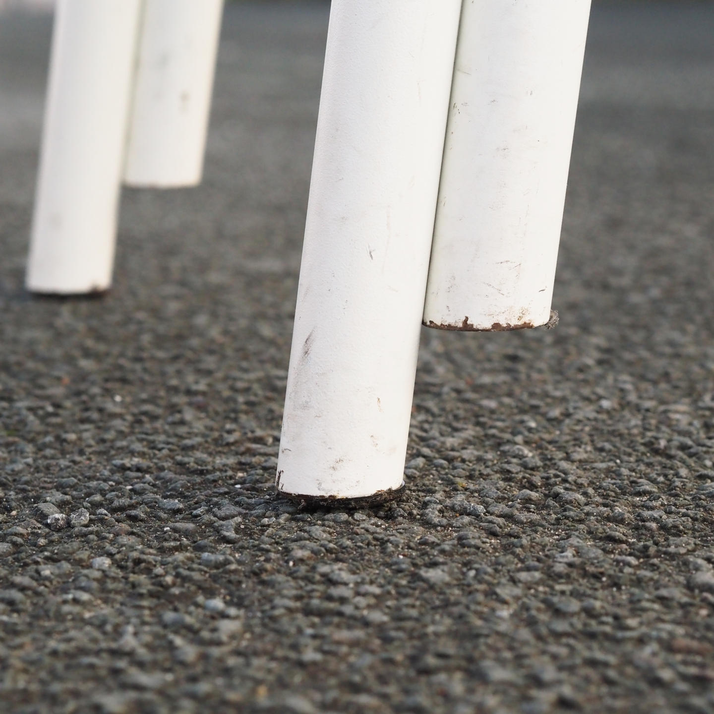 White stackable chair by Pierre-Emmanuel Vandeputte (with various coloured corners)