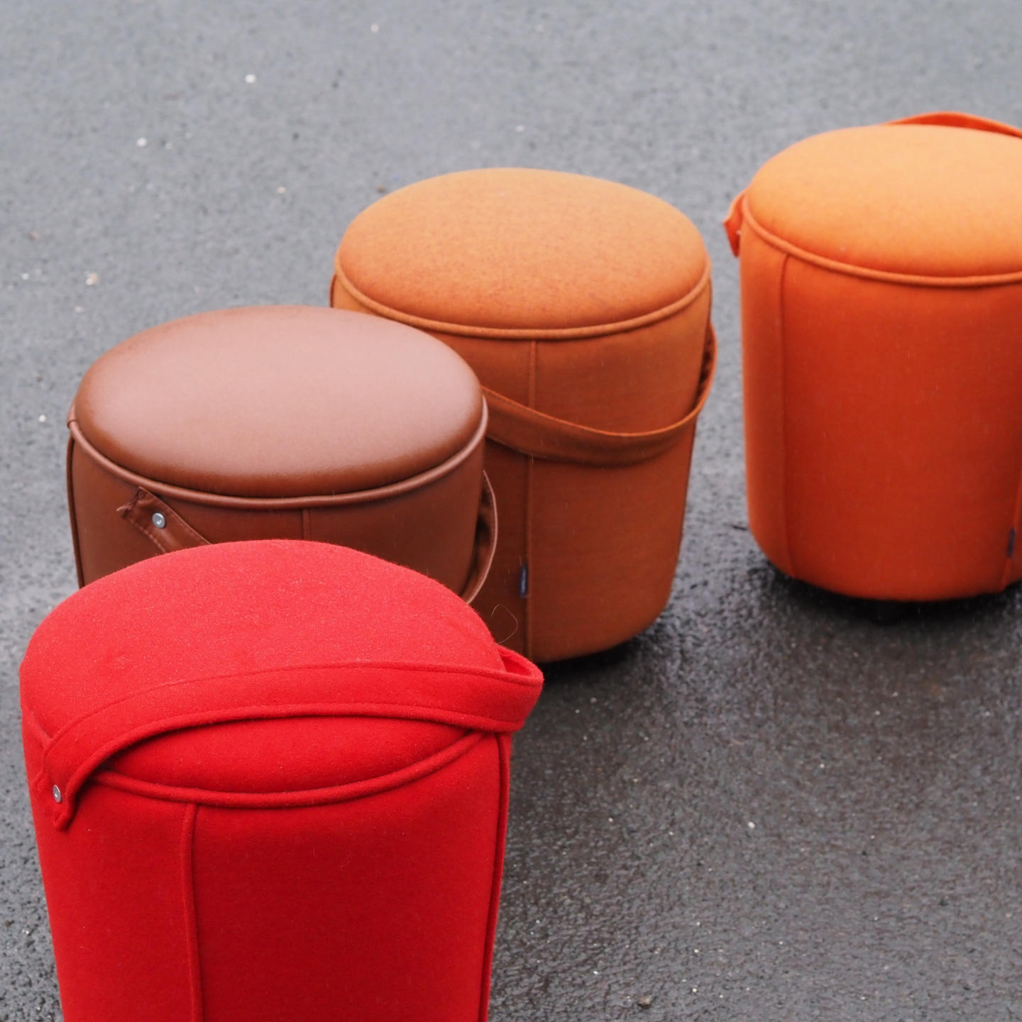 Round ottoman with belt by Satelliet (various colors/finishes)