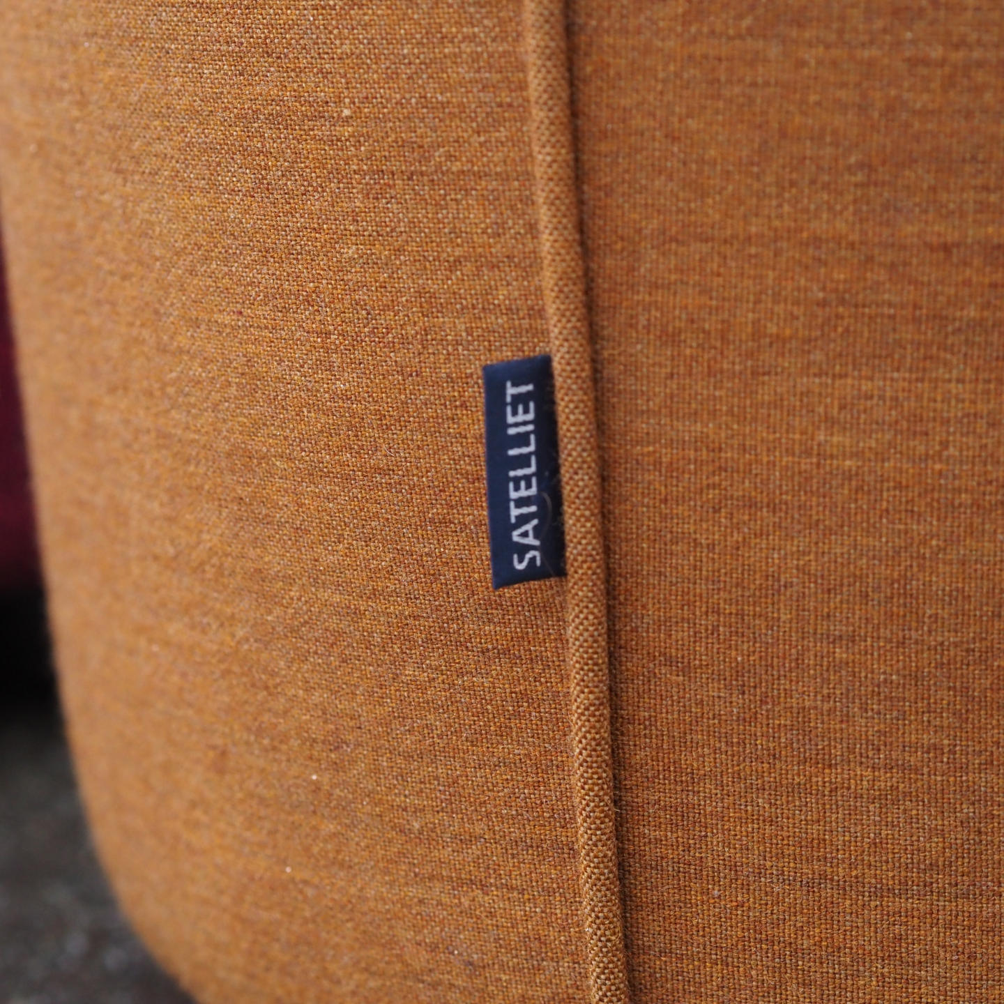 Round ottoman with belt by Satelliet (various colors/finishes)