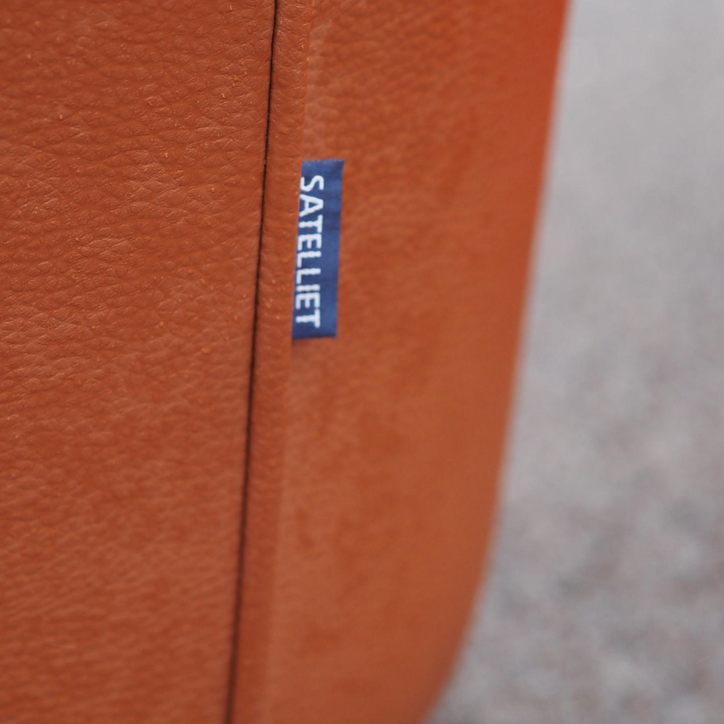 Round ottoman with belt by Satelliet (various colors/finishes)