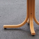 Round table with beech legs and wooden laminated tabletop