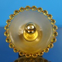 Wall sconce in orange ornate and textured glass