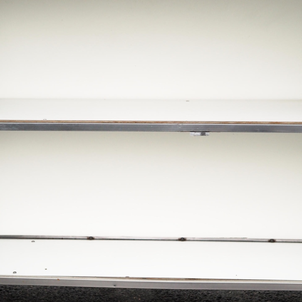 Reception desk with stainless steel frame and white laminate panels