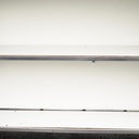 Reception desk with stainless steel frame and white laminate panels