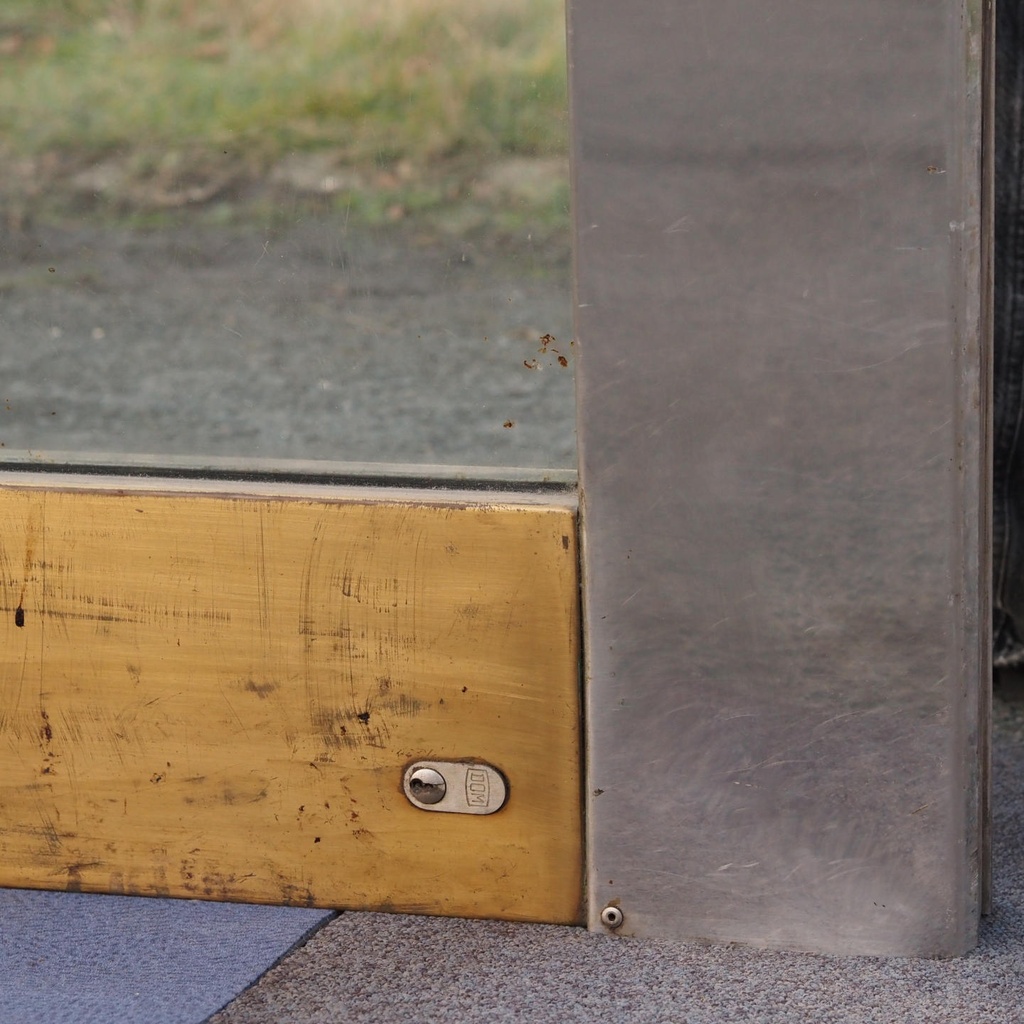 Glass door in stainless steel and bronze from the main entrance of the Générale de Banque(H. 235,5 x 108 cm)