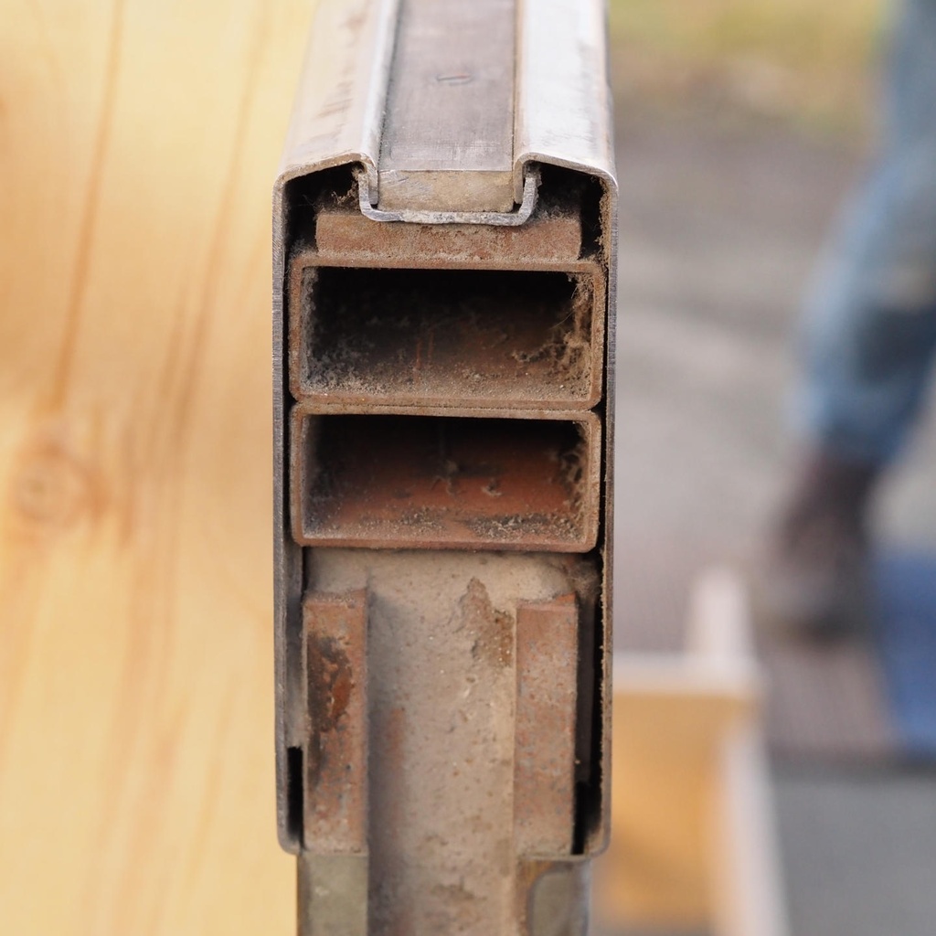 Glass door in stainless steel and bronze from the main entrance of the Générale de Banque(H. 235,5 x 108 cm)