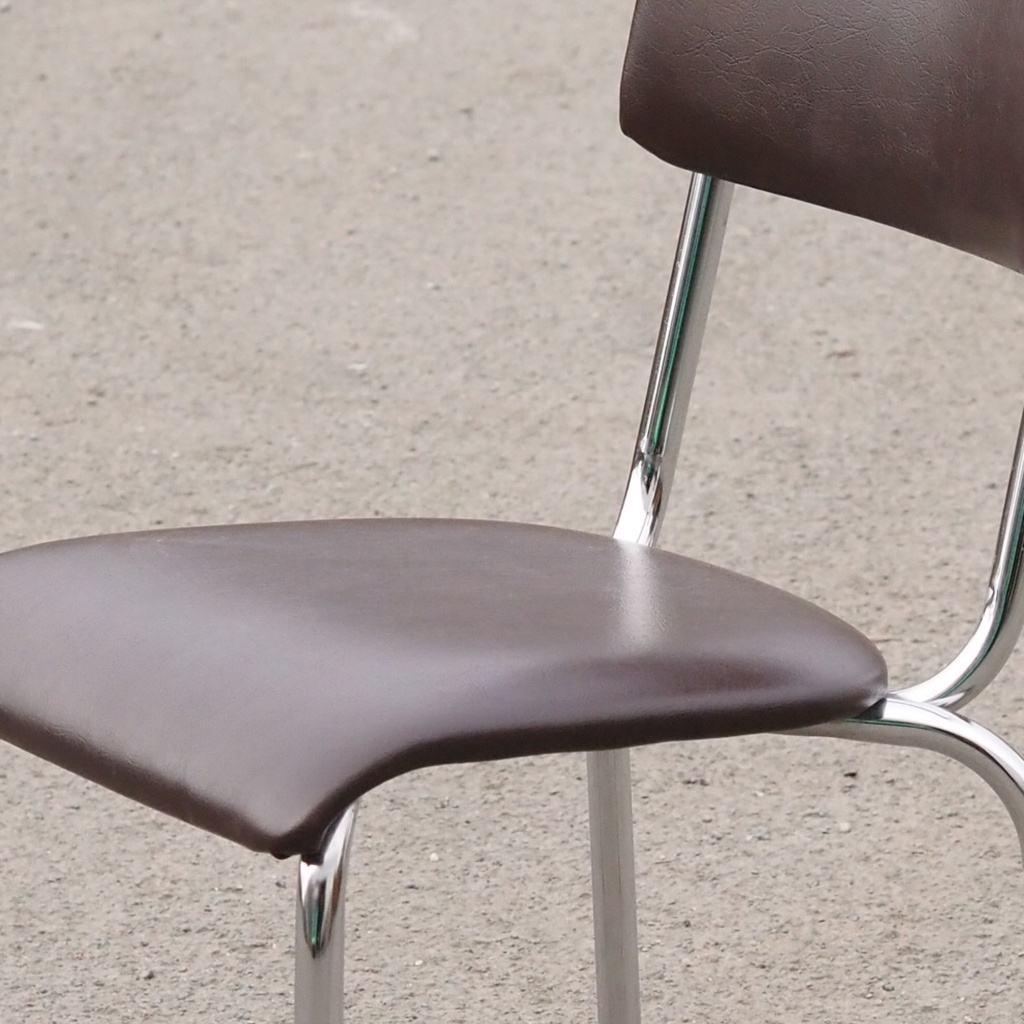 Stackable chair in brown synthetic leather