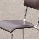 Stackable chair in brown synthetic leather