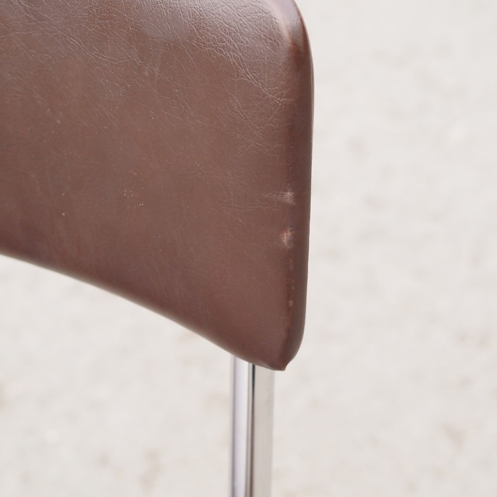 Stackable chair in brown synthetic leather