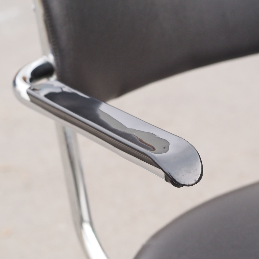 Armchair by Tubax - Black synthetic leather (ca. 1980)