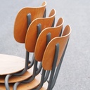 Stackable chair in plywood and lacquered steel
