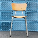 Chair in plywood and lacquered steel