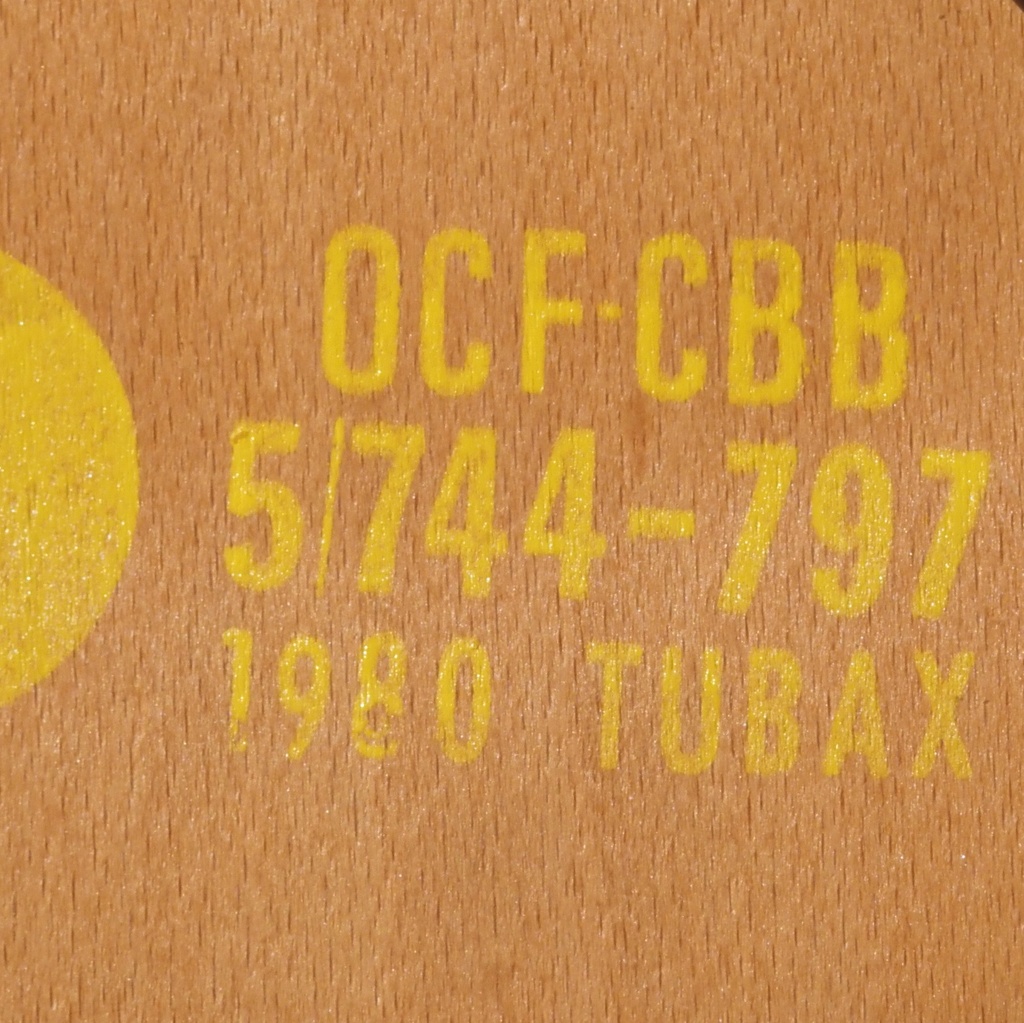 Stackable chair in plywood and lacquered steel