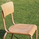 Stackable chair in plywood and lacquered steel