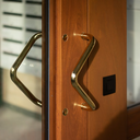 Door pull handle in stainless steel by Linea Bertomani