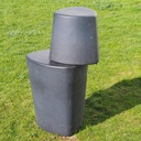 Round ottoman upholstered in various colorful fabric