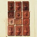 Embossed handmade tile in glazed terracotta by Emery&Cie (9,5 x 9,5 cm) - Mystic Knot