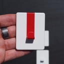 Wall hook with adhesive back