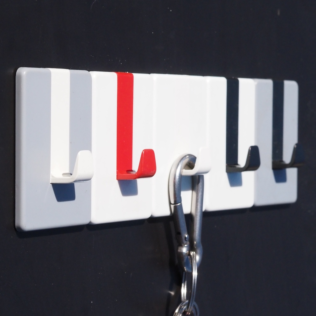 Wall hook with adhesive back
