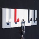 Wall hook with adhesive back