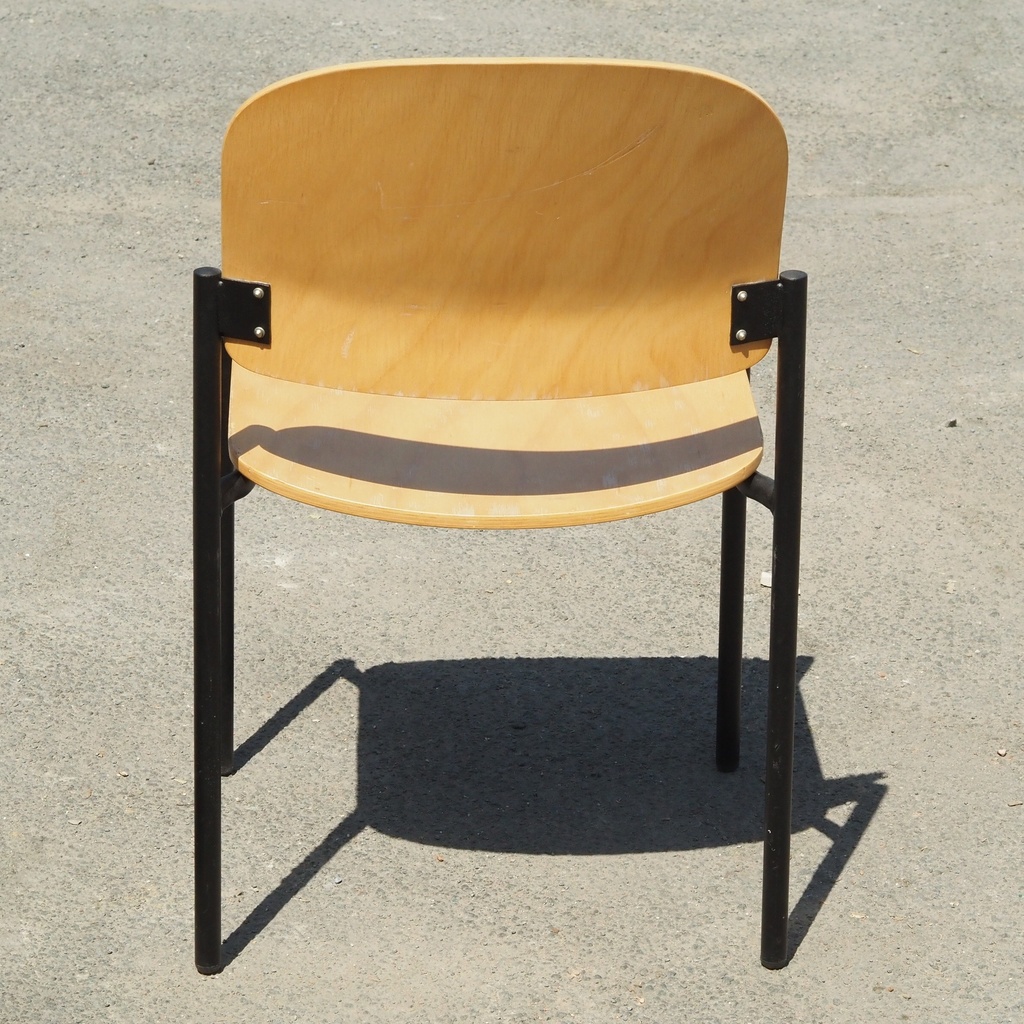 Stackable chair in varnished beech plywood and powder coated steel