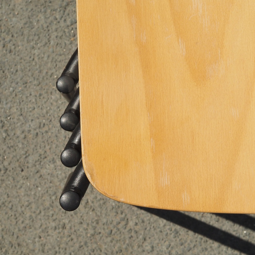 Stackable chair in varnished beech plywood and powder coated steel