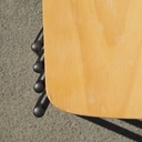 Stackable chair in varnished beech plywood and powder coated steel