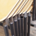 Stackable chair in varnished beech plywood and powder coated steel