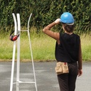 Coat rack in red coated bent steel