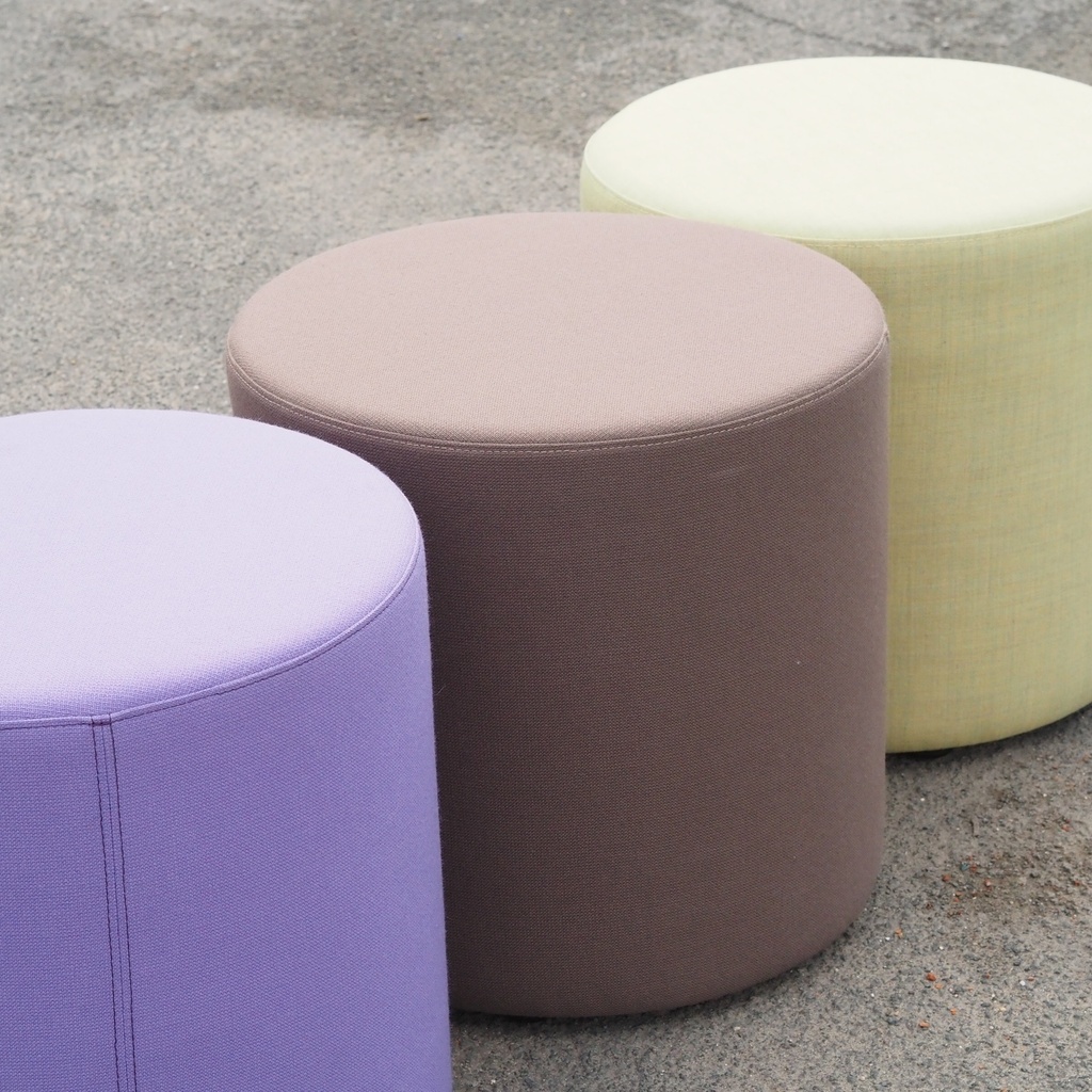 Round ottoman with belt by Satelliet (various colors/finishes)