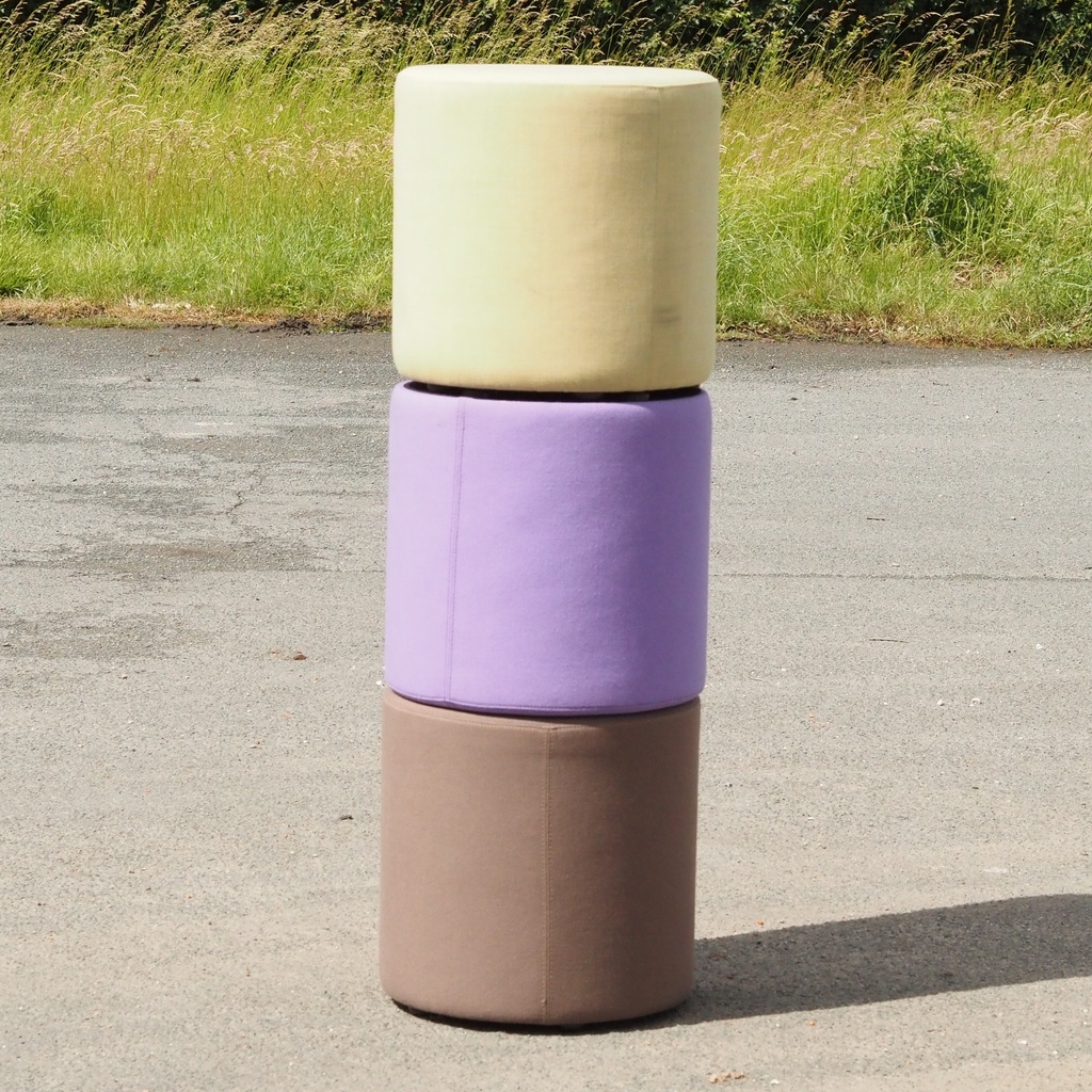 Round ottoman with belt by Satelliet (various colors/finishes)