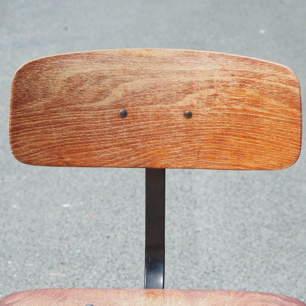 Stackable chair in varnished beech plywood and powder coated steel